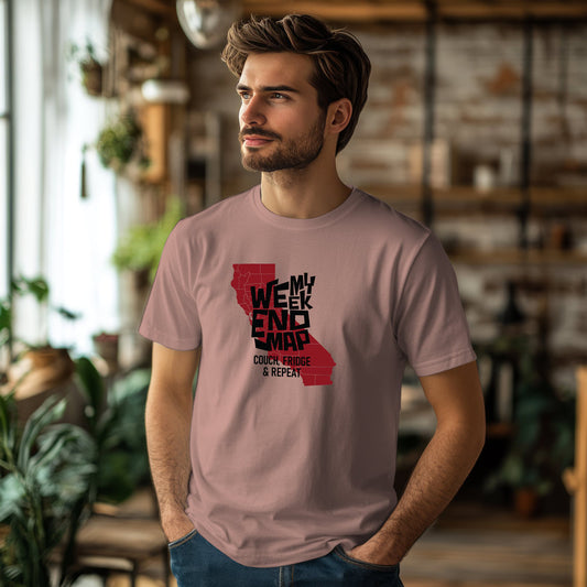 A man wearing a Mushroom crew fit t-shirt with text on it standing in a room with wooden furniture and plants.